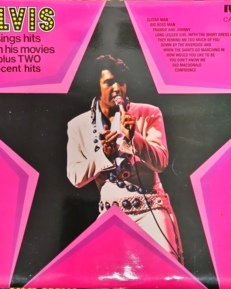 Elvis sings hits from his movies-plus two recent hits